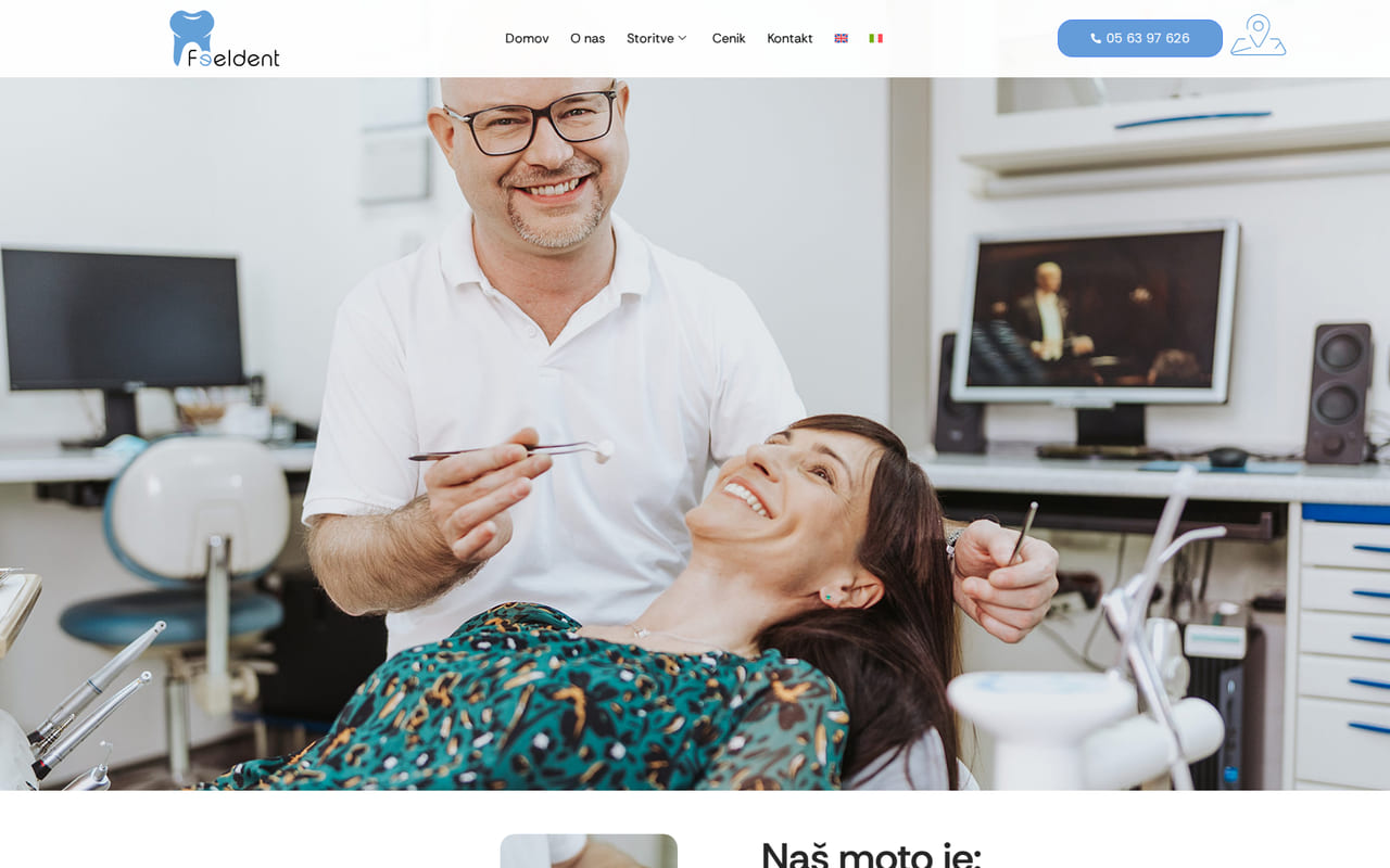 The feeldent.si home page: the Feeldent tooth logo and a Slovenian navigation reading Domov, O nas, Storitve, Cenik, Kontakt above a full-width photograph of a smiling dentist leaning over a patient in the chair.